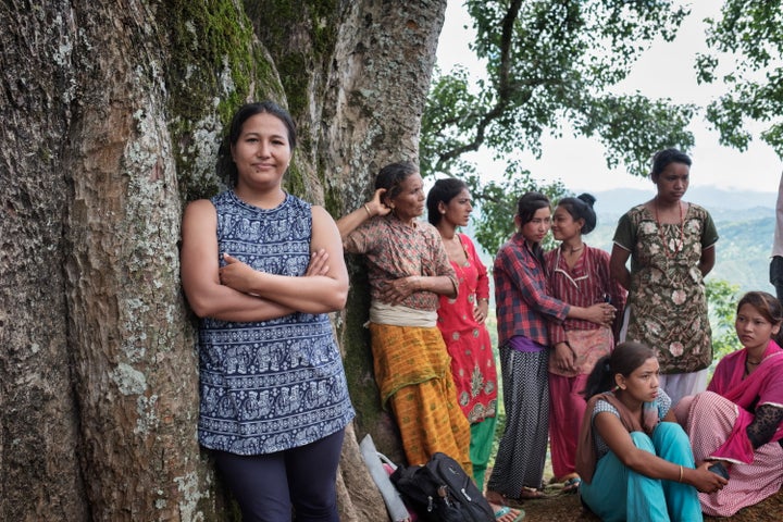 Pramita Maharjan, a WaterAid staff member, stands for a portrait during a community sanitation triggering meeting organized by KIRDARC in Kharelthok Village, Kavrepalanchok District