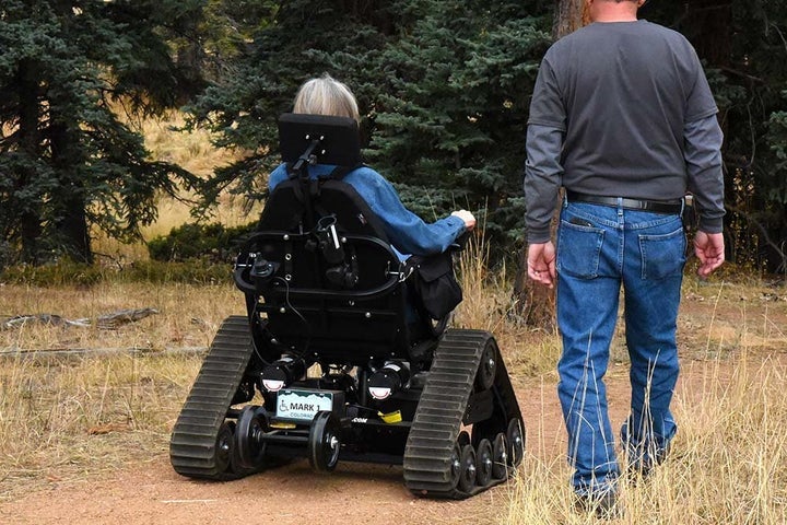 A woman tests out the park’s new chair, dubbed the “Mark 1.”