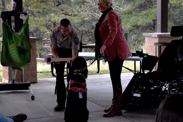 Madsen’s former service dog, Sparky, presented a symbolic key to Staunton Park manager Zach Taylor during the ceremony.