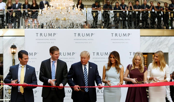 Donald Trump and his family cut the ribbon on a new Trump International Hotel in Washington, D.C. on Wednesday in what the New York Times called another "remarkable display of personal promotion by a presidential nominee."