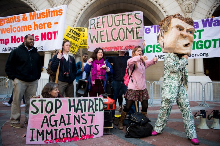 Protesters rally outside the ribbon cutting ceremony for the new Trump International Hotel in Washington D.C. on Wednesday, Oct. 26.