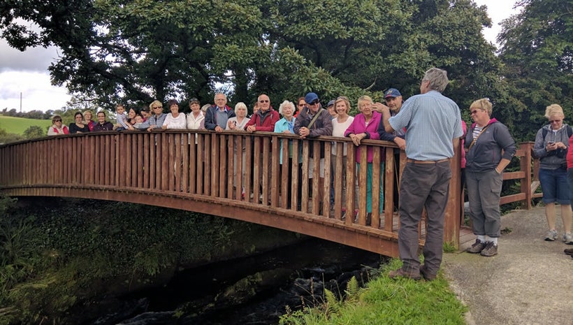 Hikers pause to hear history commentary