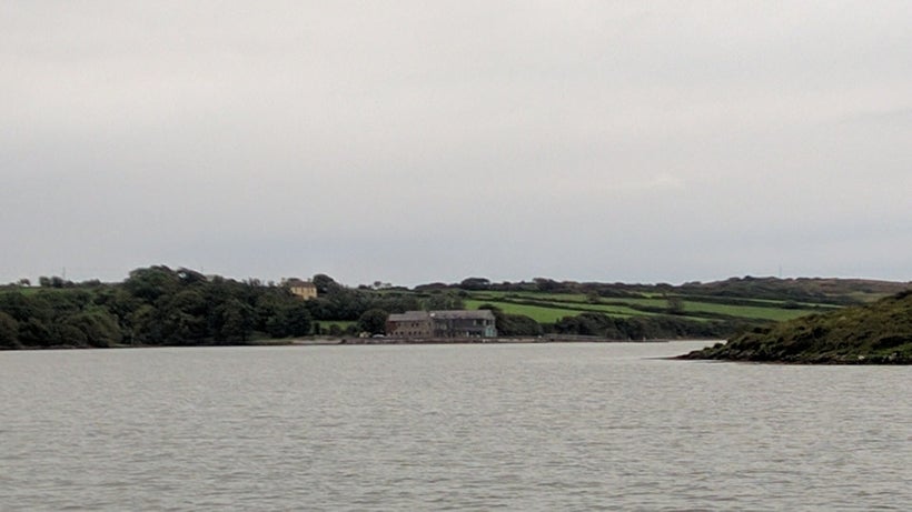 The Ilen River flows toward the sea