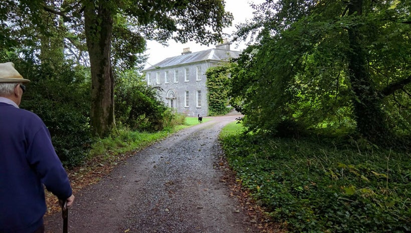 Robert Townshend led up the path to Drishane House