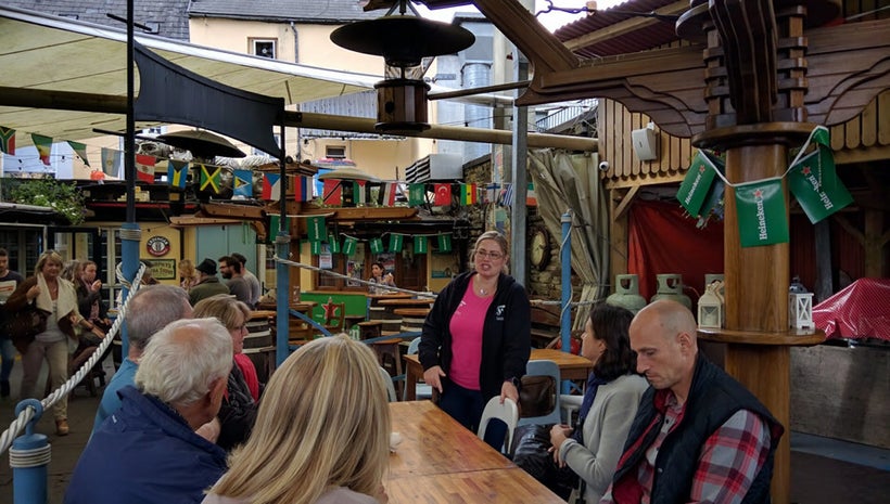 The tour concludes at a friendly outdoor pub