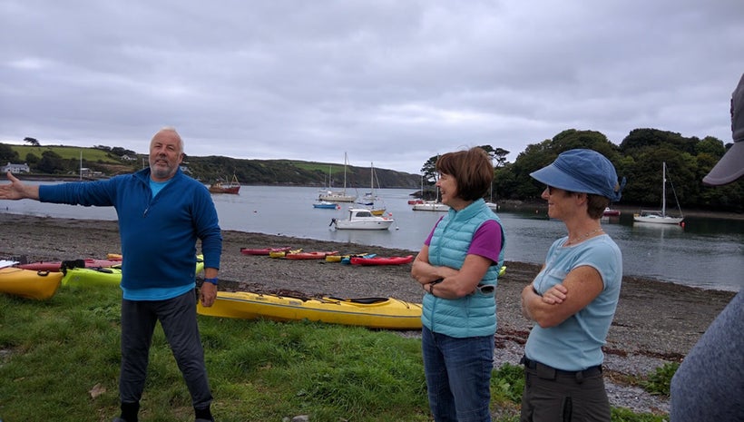 At the cove Jim Kennedy conducts kayak orientation