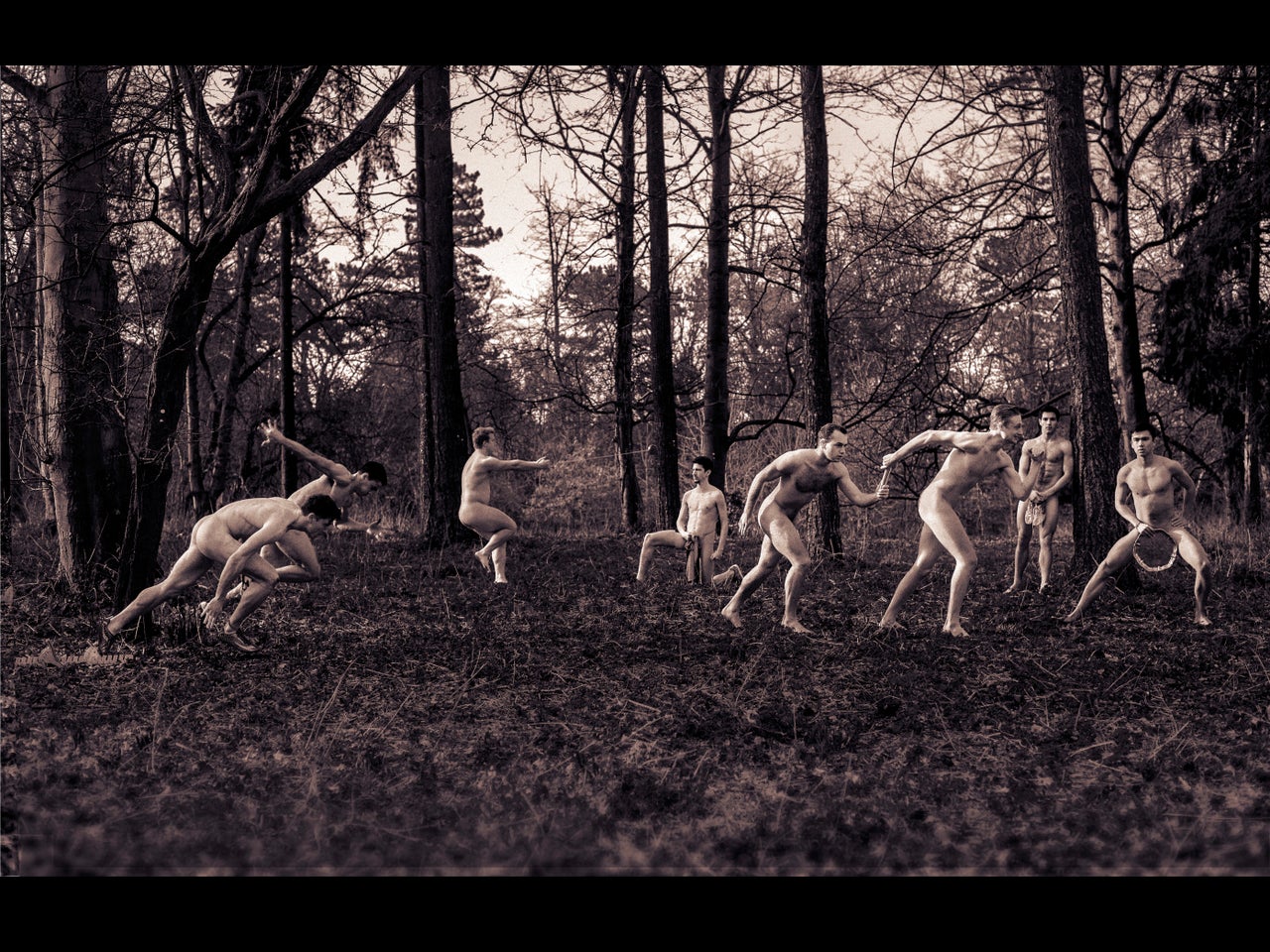 The athletics team strip down for a practice in the woods