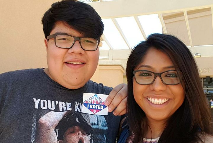 Alejandro Castro poses with his "I voted" sticker on the day of the 2016 Nevada primary, joined by his sister, Erika Castro.