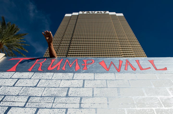 Protesters erect a cardboard wall in front of the Trump International Hotel Las Vegas during the Culinary Union's Wall of Taco Trucks protest on Oct. 19. 