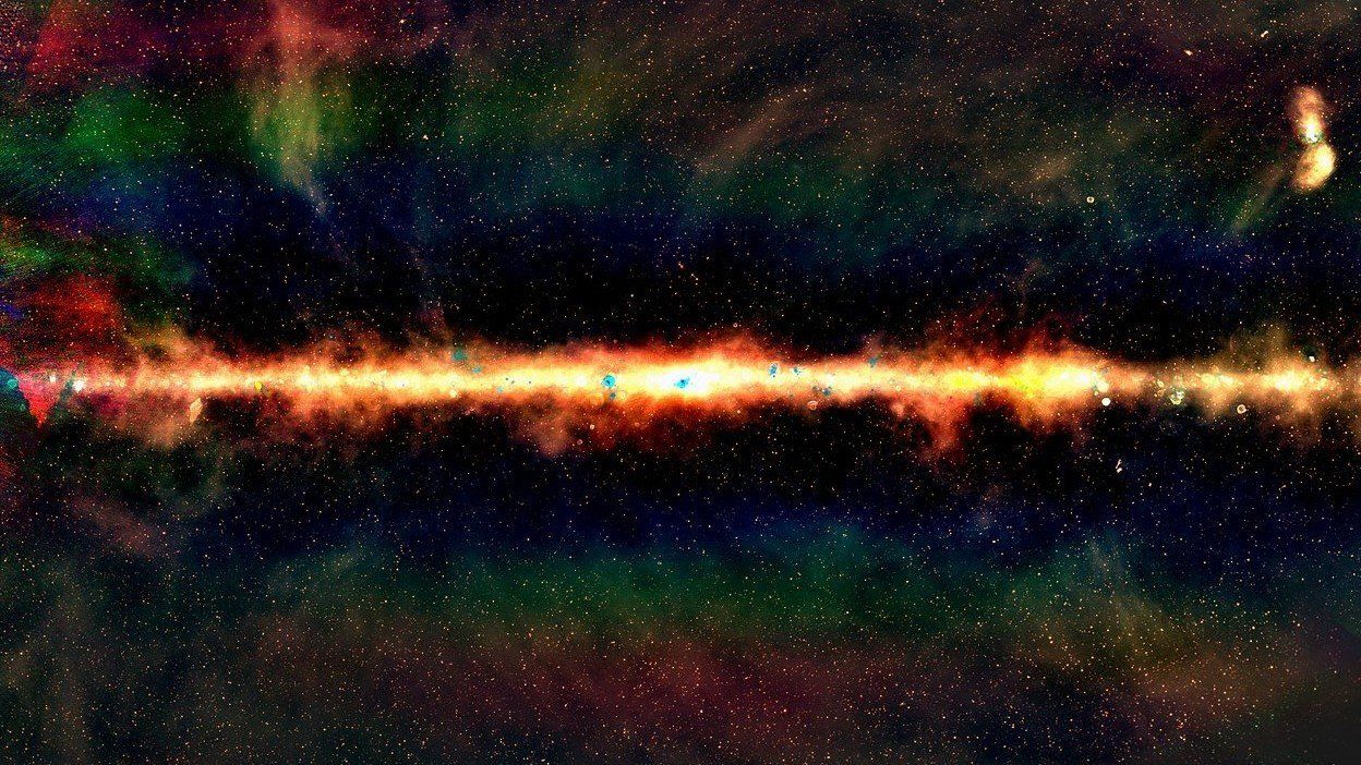 The GLEAM view of the center of the Milky Way in radio color. Red indicates the lowest frequencies, green the middle frequencies and blue the highest frequencies. Each dot is a galaxy with around 300,000 radio galaxies observed as part of the GLEAM survey.