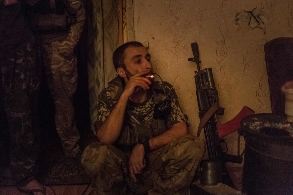 Avram pauses for a cigarette during a heavy night of fighting.