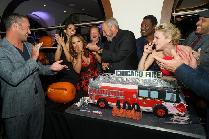 <p>NBCUNIVERSAL EVENTS -- "One Chicago Day" -- Pictured: (l-r) Taylor Kinney, Miranda Rae Mayo, Monica Raymund, Christian Stolte, Dick Wolf, Eamonn Walker, Kara Killmer, Joe Minoso at the "One Chicago Day" Party at Swift & Sons Steakhouse in Chicago, IL on October 24, 2016 </p>
