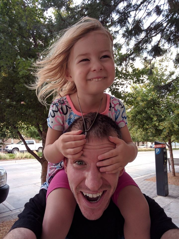 Austin and his daughter "goofing around"