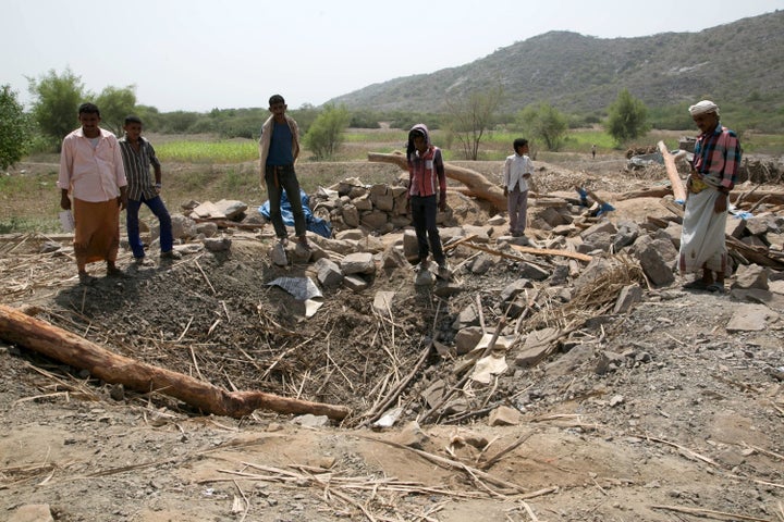 Yemenis assess the aftermath of Saudi-led airstrikes on Oct. 27, 2016.