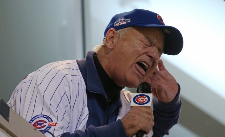 Bill Murray sings 'Take Me Out to the Ball Game' during Game 3 of the World Series between the Chicago Cubs and Cleveland Indians on Friday at the Wrigley Field.