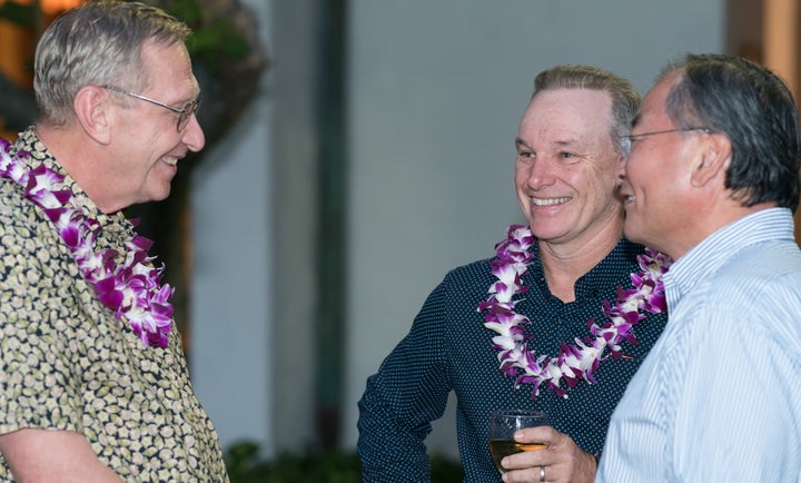 Gary Hogan of the Hogan Family Foundation (center) chats with Chaminade University President, Bro. Bernard Ploeger Ph.D. (left) and Ted Liu, Director, Referentia Systems Inc.