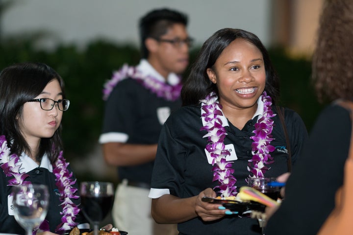 <em>Hogan students had the opportunity to introduce themselves to the many business executives at the reception following the