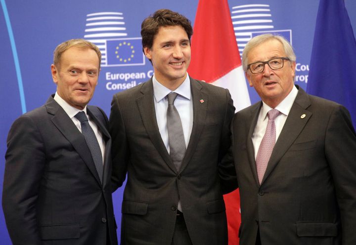 European Commission President Jean-Claude Juncker, right, European Council President Donald Tusk, left, and Canadian Prime Minister Justin Trudeau, centre, as they arrive for an EU-Canada summit in Brussels.