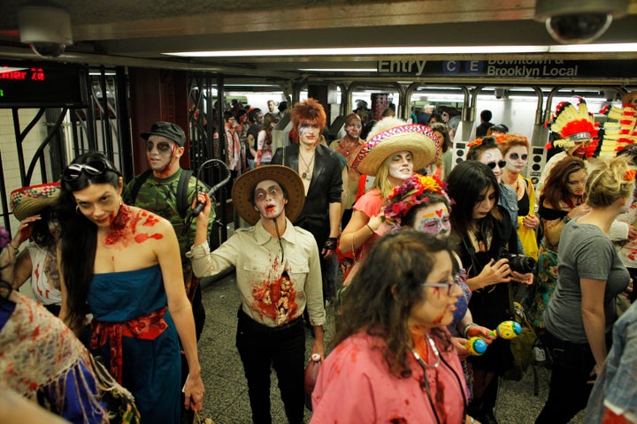 People dressed like zombies swarm a New York City subway during an annual "ZOMBIECON" event. The Big Apple ranked last for safest place during a zombie apocalypse.