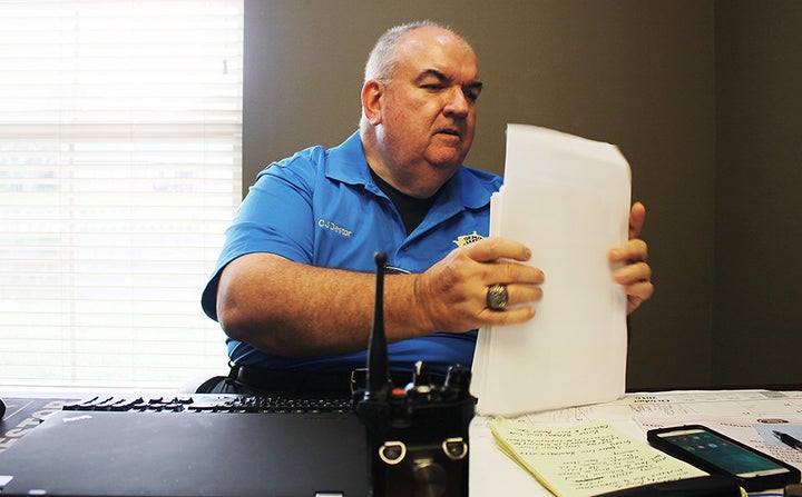 Major C.J. Destor works in his office at the St. John the Baptist Sheriff's office in LaPlace, Louisiana, on Oct. 20.