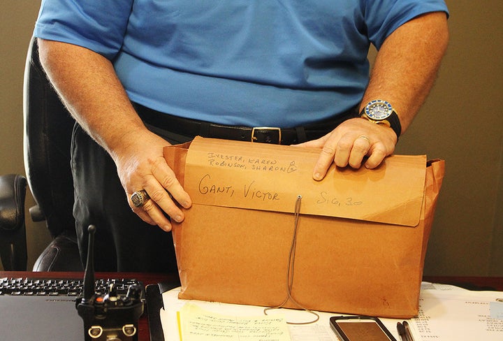 Major C.J. Destor with his case file on Victor Gant.