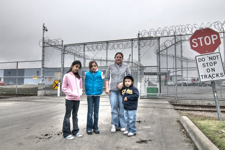 A family outside the Northwest Detention Center in Tacoma, Washington. The facility is run by a private prison contractor for