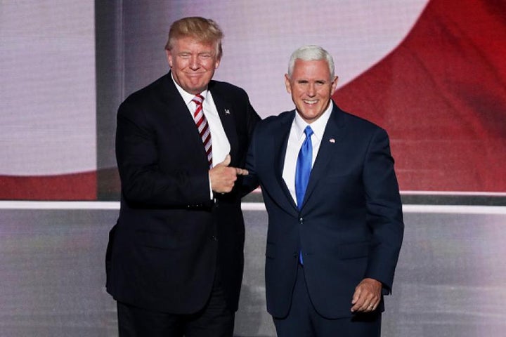 Trump stands with Mike Pence.