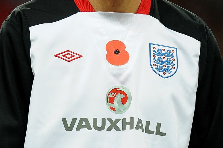 There are questions over whether England footballers will be allowed to wear poppies on 11 November