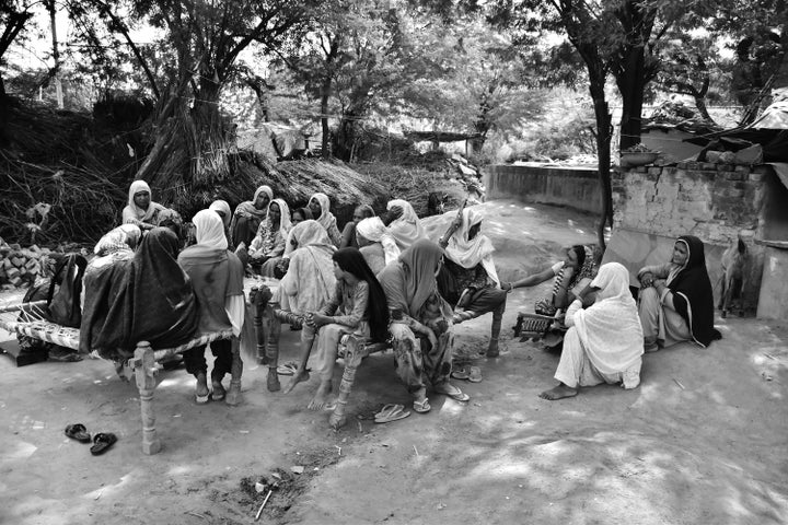 The women of Kherla village in northern India gather to listen to their favorite radio program on Radio Mewat. The community radio station airs discussions and advice on health, education and finance to the villagers in isolated and impoverished Mewat district.