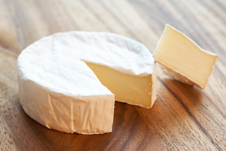 A wheel of Brie cheese.