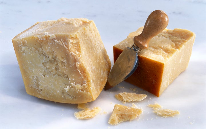 A wheel of Parmesan cheese.