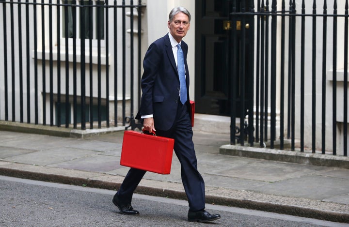 Chancellor of the Exchequer Phillip Hammond arrives in Downing Street.