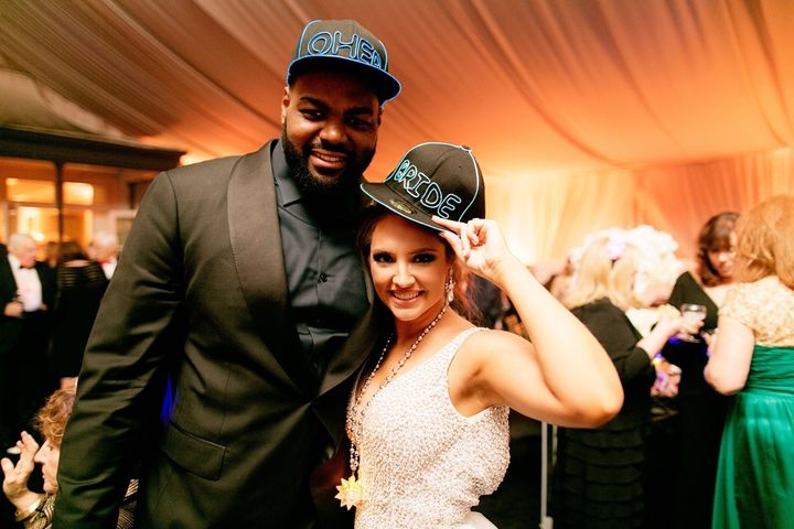 <p>Collins Tuohy and Michael Oher of ‘The Blind Side’ celebrate at Tuohy’s wedding.</p>