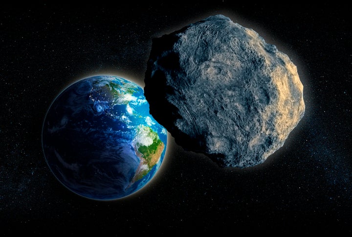 Computer art of an asteroid approaching Earth.