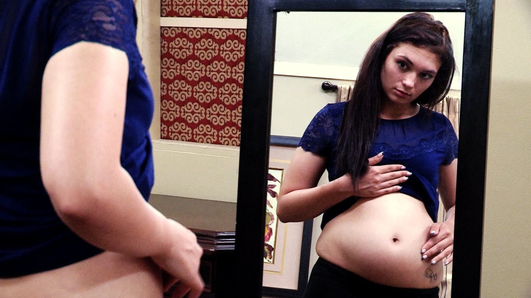 The teen claims that she is 9 months pregnant and about to deliver a baby b...