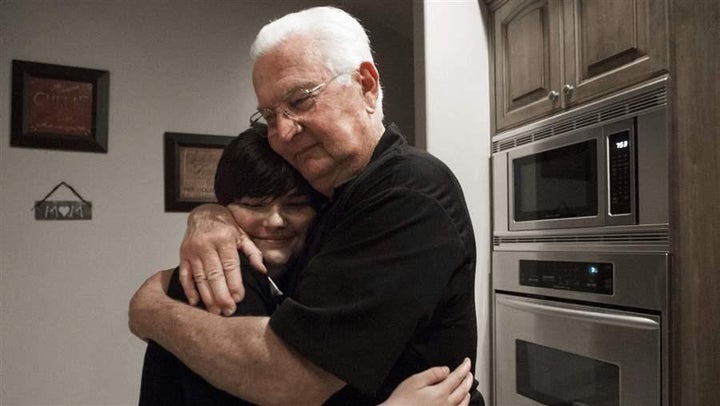 Bill Pendleton with granddaughter Audrey at their home in Draper, Utah. More grandparents are raising grandchildren because their parents are unable to.