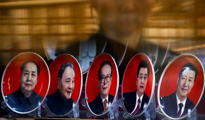 Souvenir plates with portraits of former Chinese leaders Mao Zedong, Deng Xiaoping Jiang Zemin, Hu Jintao and current Preside