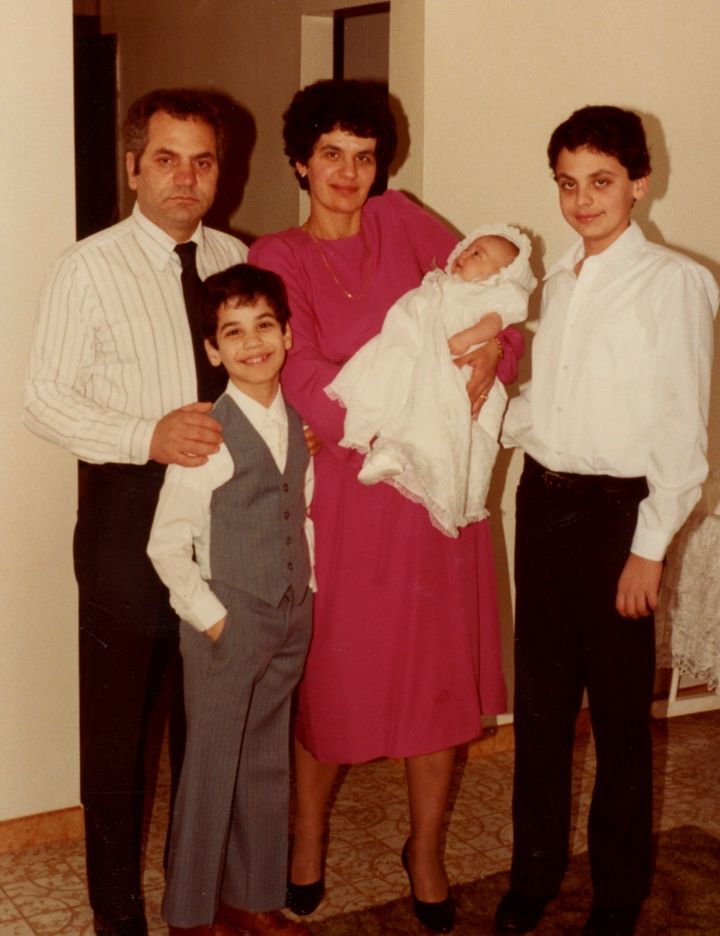 <p>My family at my baptism. From left to right: My father, Francesco, my brother, Phil, my mother, Anna, me, and my brother, Pat.</p>