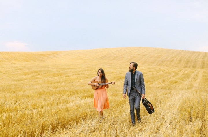 Line Leaders: Notice how many subtle lines are part of this composition: the angle of the guitars, the cuts of the field, the horizon, the position of their bodies, the movement of their clothes… all lending direction and design.