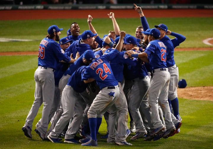 The Chicago Cubs celebrate after defeating the Cleveland Indians 8-7 in Game Seven of the 2016 World Series.