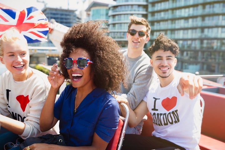 Tourists in London, possibly American.