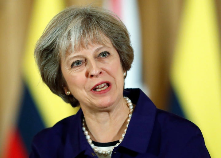 Britain's Prime Minister Theresa May and Colombia's President Juan Manuel Santos (not shown) speak to journalists after their bilateral meeting at 10 Downing Street in London, November 2, 2016.