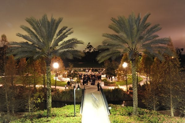 A Helicopter Fairytale at Signature Island in Orlando, Florida: A truly breathtaking backdrop for your nuptials, Signature Island at the Waldorf Astoria Orlando and Hilton Orlando Bonnet Creek offers a natural flowing creek through it for a beyond tranquil aura and matchless views of golf courses, palm trees, and more. Make a razzle dazzle entrance on your own private helicopter before sealing the deal as the majestic sunsets in the background. Did we mention a fireworks show during your first dance?