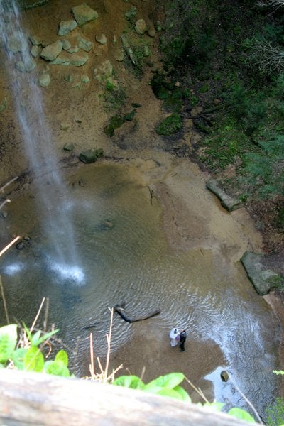 A Cave- and Waterfall-side Wedding In Hocking Hills, Ohio: Don your bridal veil next to a breathtaking waterfall inside Ash Cave in Hocking Hills, where romance and natural beauty await at every corner. There, you can get hitched in a mammoth 100-foot deep overhanging cave as your officiant stands on Pulpit Rock, and your guests can get misty over your vows in this 200 million-year-old cave, which acts like a megaphone thanks to its amphitheater-like shape. Come nightfall, retreat into a cozy cabin in the park before awaking early for a sunrise hike.