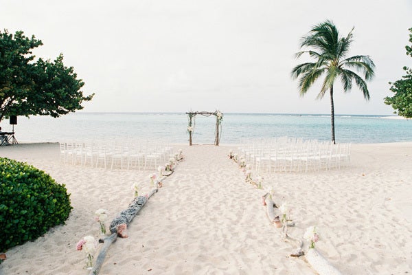 <p><strong>Off-the-Grid Luxury Beach Wedding on Oil Nut Bay in the British Virgin Islands: </strong>To get to this bespoke and lavish locale, you’ll have to arrive via boat or helicopter. But once you arrive, you’ll be pampered like nothing you’ve ever experienced before: gourmet cuisine and total seclusion will bookend your nuptials, while your ceremony steals the spotlight with pristine beaches and views of the greenish-blue Caribbean sea. The events team will work with you to provide a custom experience you and your wedding guests won’t soon forget.</p>