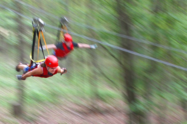 <p><strong>A Zipline Wedding in Hocking Hills, Ohio: </strong>Adrenaline junkies, you won’t want to miss out on this chance to say you celebrate your I dos as you soar through the air at Hocking Hills Canopy Tours. First, you’ll get hitched at the top of the 85-foot-tall Super Zip, and then you’ll cruise at 40-miles per hour through the treetops. Want to tack on more adventure? Try a Segway tour or bundle your zipping with a climb or rappel package. Pro tip: The fall foliage is every bit as gorgeous scenery-wise as you’d imagine – and then some.</p>