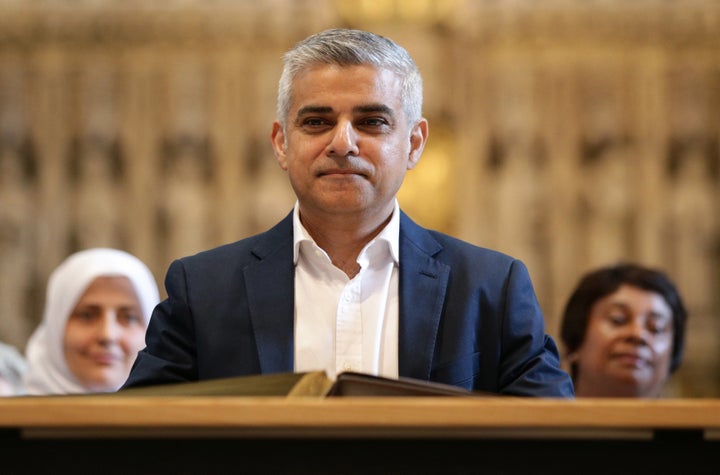 Sadiq Khan attends an official signing ceremony as he begins his first day as newly elected Mayor of London on May 7, 2016 in