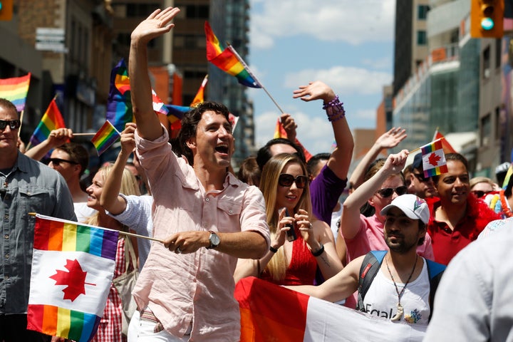 Trudeau attending Toronto's annual Pride Parade with Ontario's Kathleen Wynne, the first openly gay elected Premier in the country.