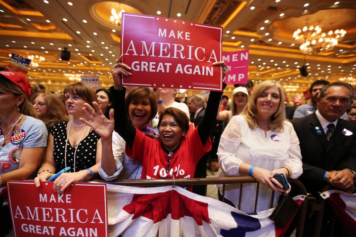 Supporters watch as Republican presidential nominee Donald Trump speaks during a campaign rally at the Venetian Hotel in Las