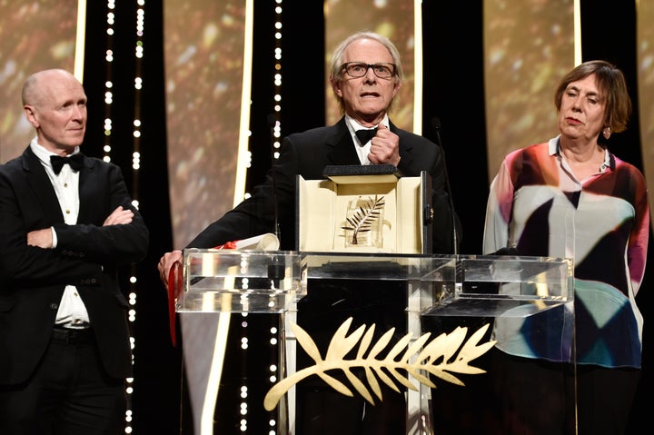 (Left to right) I, Daniel Blake's writer Paul Laverty, Loach and producer Rebecca O'Brien on stage after the film won the Palme d'Or at Cannes in May